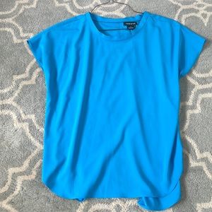 Turquoise blue viscose short sleeve blouse with back seam openings